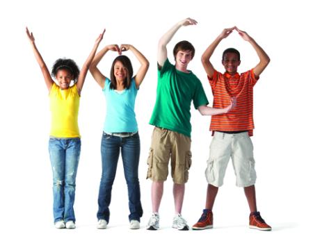 A diverse group of teens forming YMCA with their arms