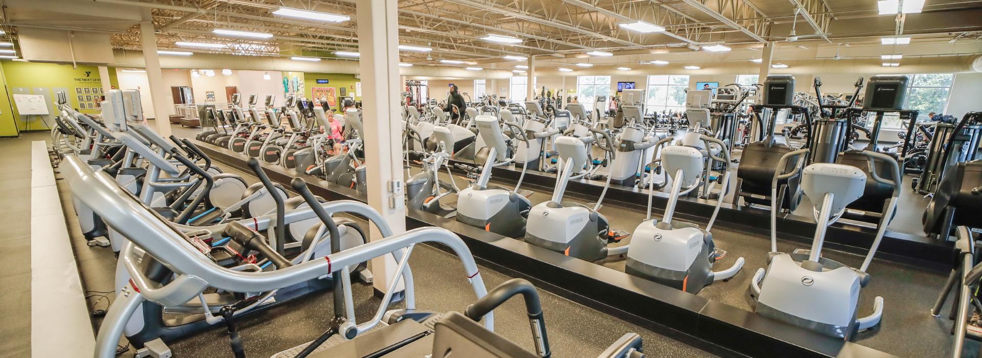 Cardio equipment including treadmills, ellipticals, bikes and steppers in the wellness center at the Princess Anne Family YMCA