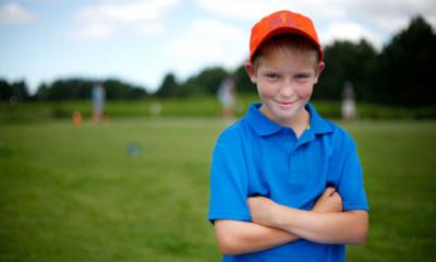 child on golf course