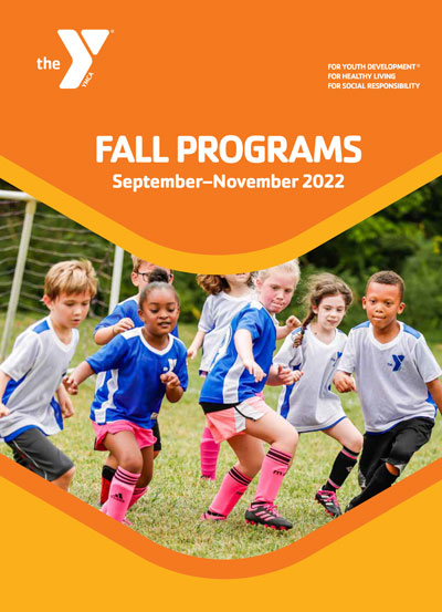 program guide cover with image of youth soccer players
