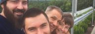 John Settle and Family taking a Group Selfie