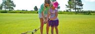 First Tee — Hampton Roads instructor teaching girl