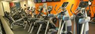 Cardio equipment in the wellness center at the Albemarle Family YMCA, including treadmills, bikes, ellipticals and steppers