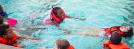 YMCA Camp Arrowhead campers swim in the pool