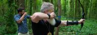 Camp donors try their hand at archery at YMCA Camp Red Feather