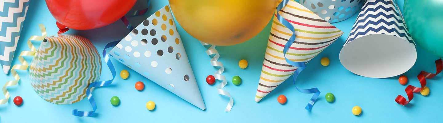 Party hats, balloons and ribbons