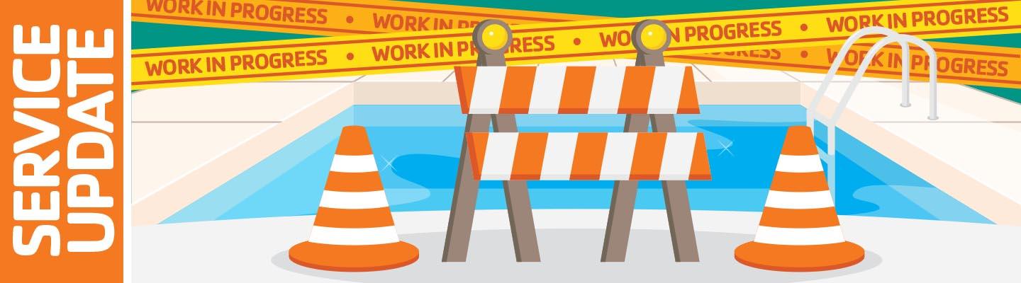 Construction blockade in front of pool to indicate a closure