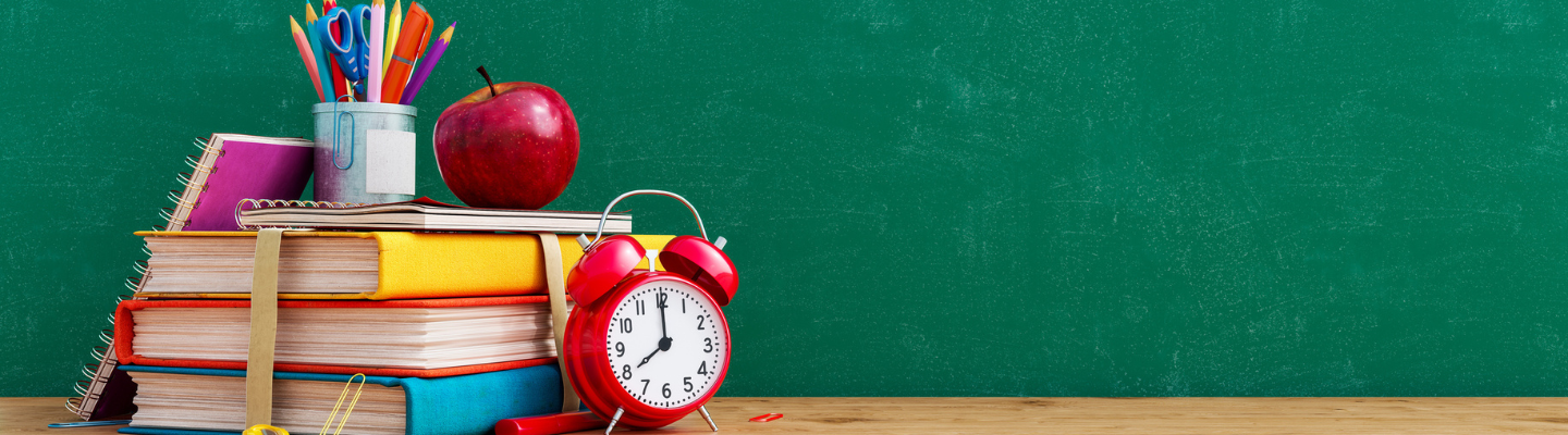 Ready for school concept background with books, alarm clock and accessory