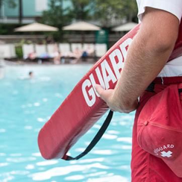 close up of lifeguard equipment by the pool