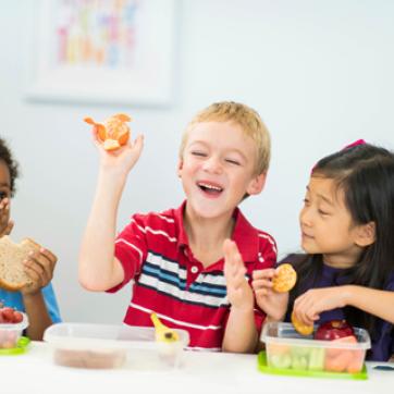 Kids enjoying healthy food