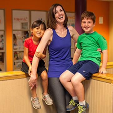 Mom with 2 kids in the child care at the YMCA