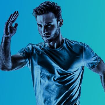 Cut out image of a man running with a blue to green gradient background