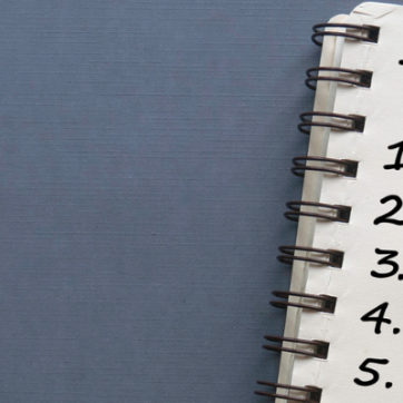 a notepad that says to do list with a black pen next to it
