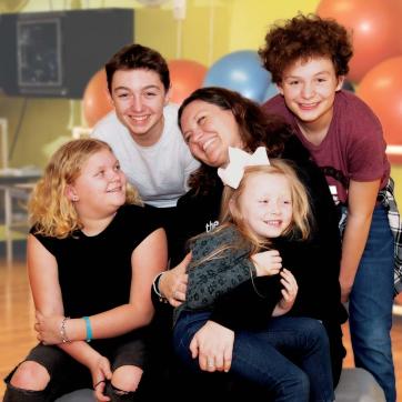 Y member Ashley, with her four children at the Y