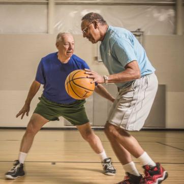 Y members Ernie & Eugene on the basketball court
