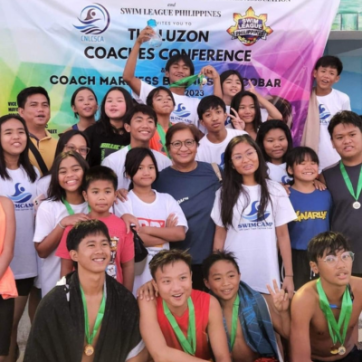 Thess and her swim team in the Philippines
