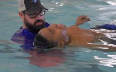 YMCA swim instructor in a swimming lesson