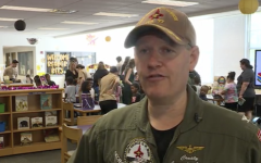 Navy sailors throw lifeline to community for children's literacy