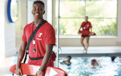 Teen lifeguard by the pool