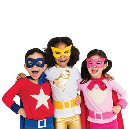 Three friends dressed as superheroes