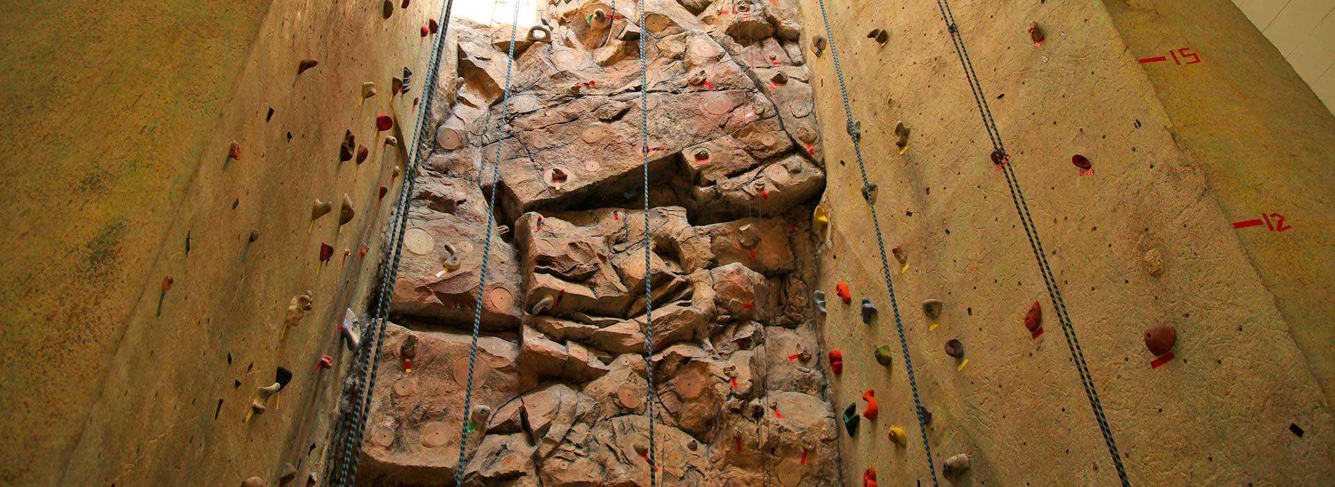 looking up at a rock wall