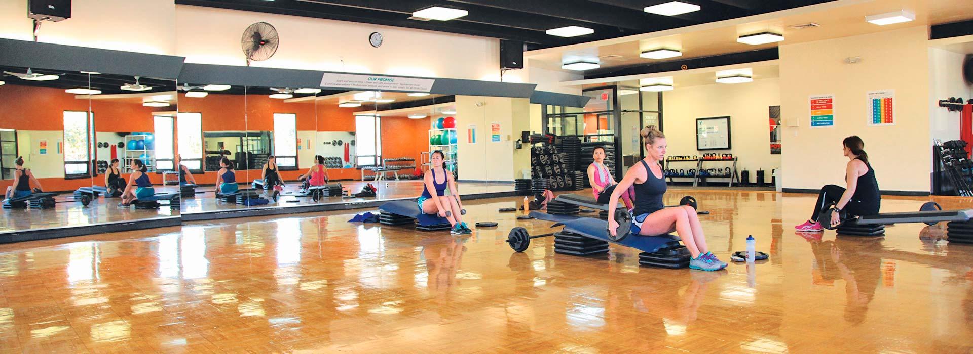 people working out in group exercise class