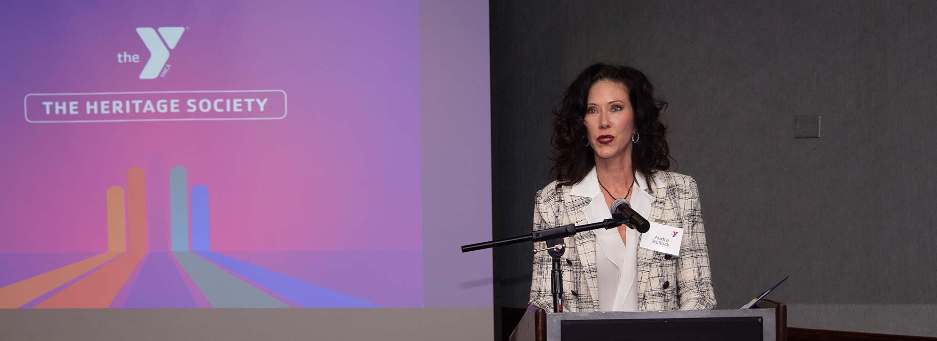 Tidewater Friends of Foster Care Founding Director and President Audra Bullock speaks Heritage Society members during the 2023 Heritage Society event
