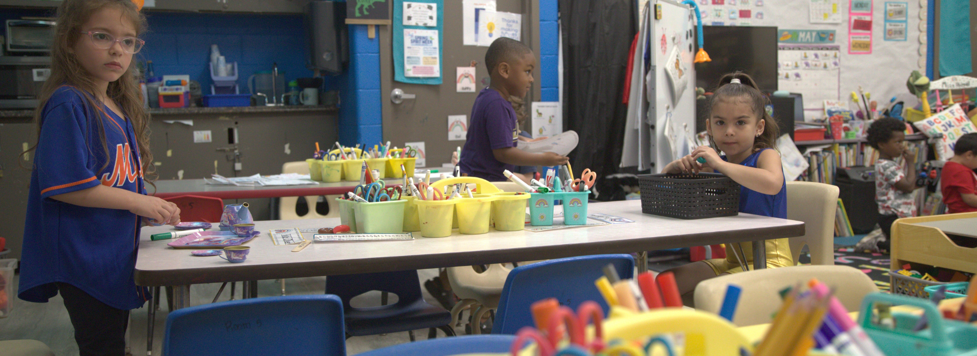 Kids coloring in a classroom at the Mt. Trashmore Family YMCA preschool