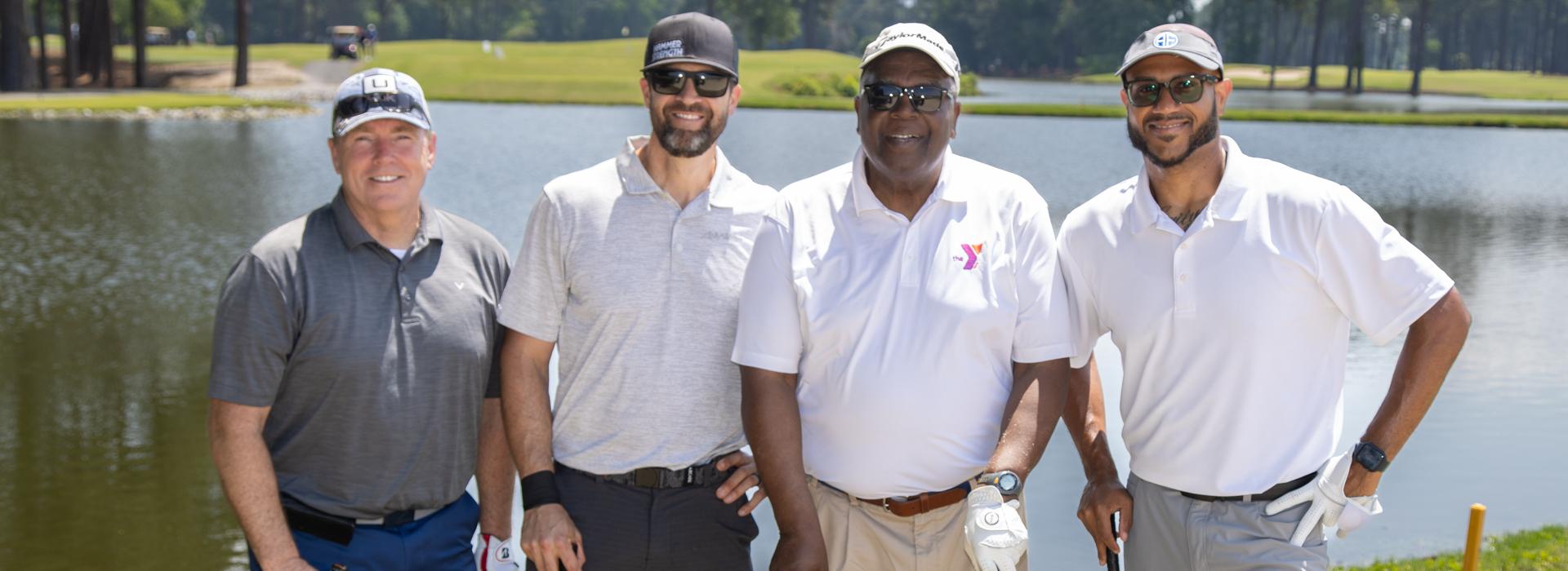 4-man golf team outside on a golf course at the YMCA Charity Golf Classic 2025