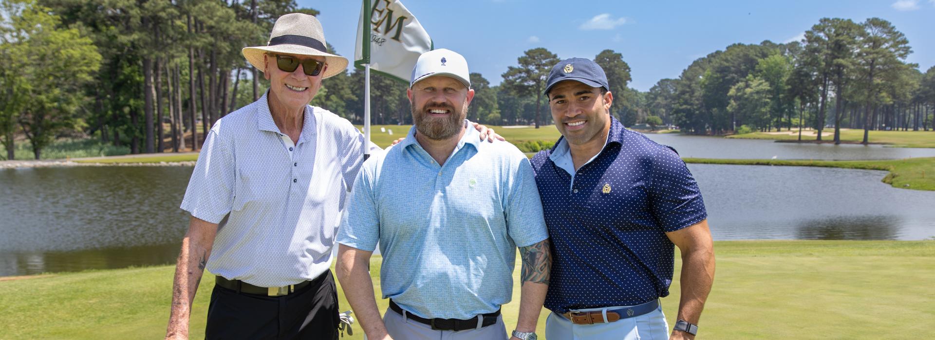 3-man golf team outside on a golf course at the YMCA Charity Golf Classic 2025