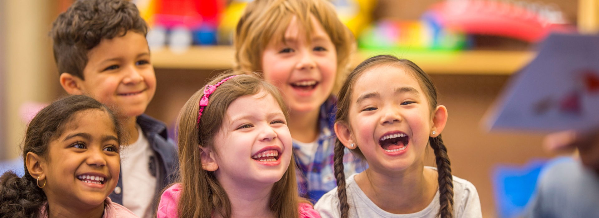 Smiling kids in a playroom