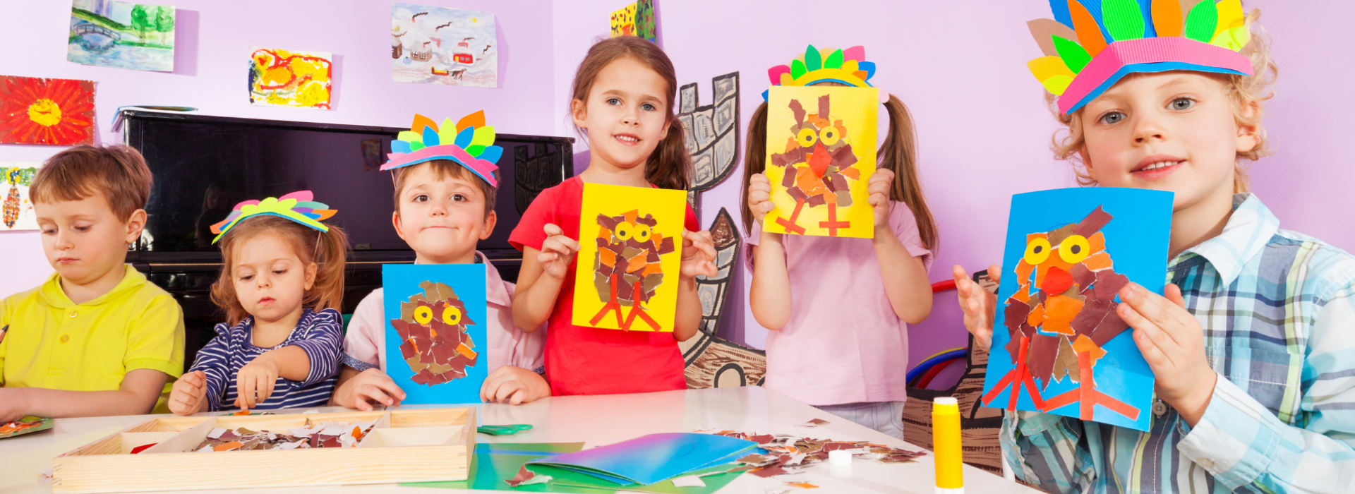 Camp kids showing off their arts and crafts