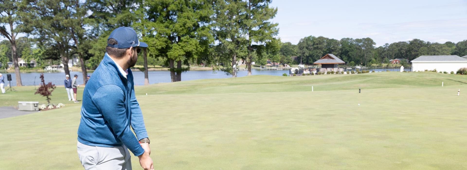 Man getting ready to swing a golf club