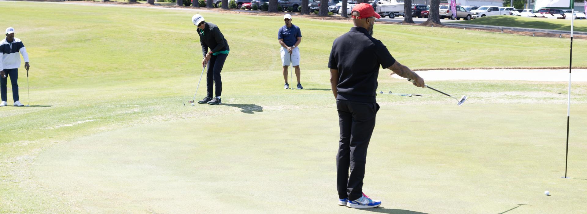 Men on the putting green