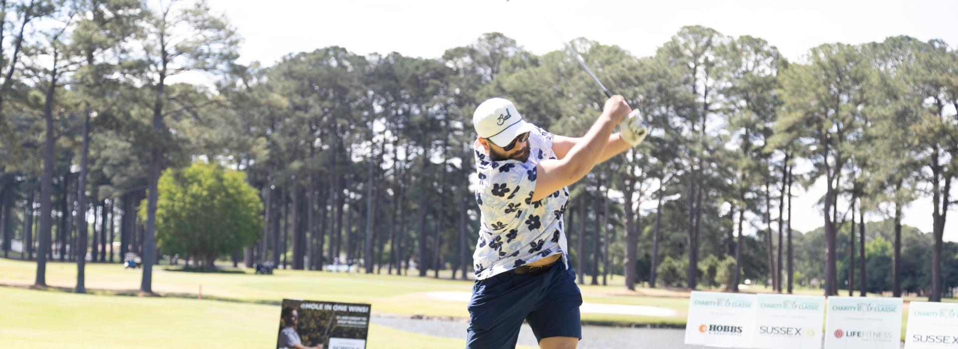 man golfing