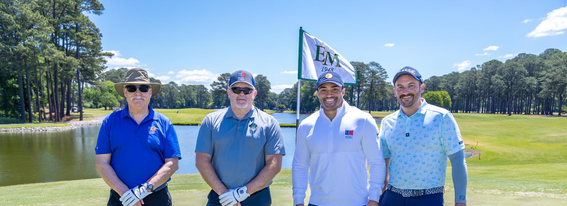 4 men on the golf course