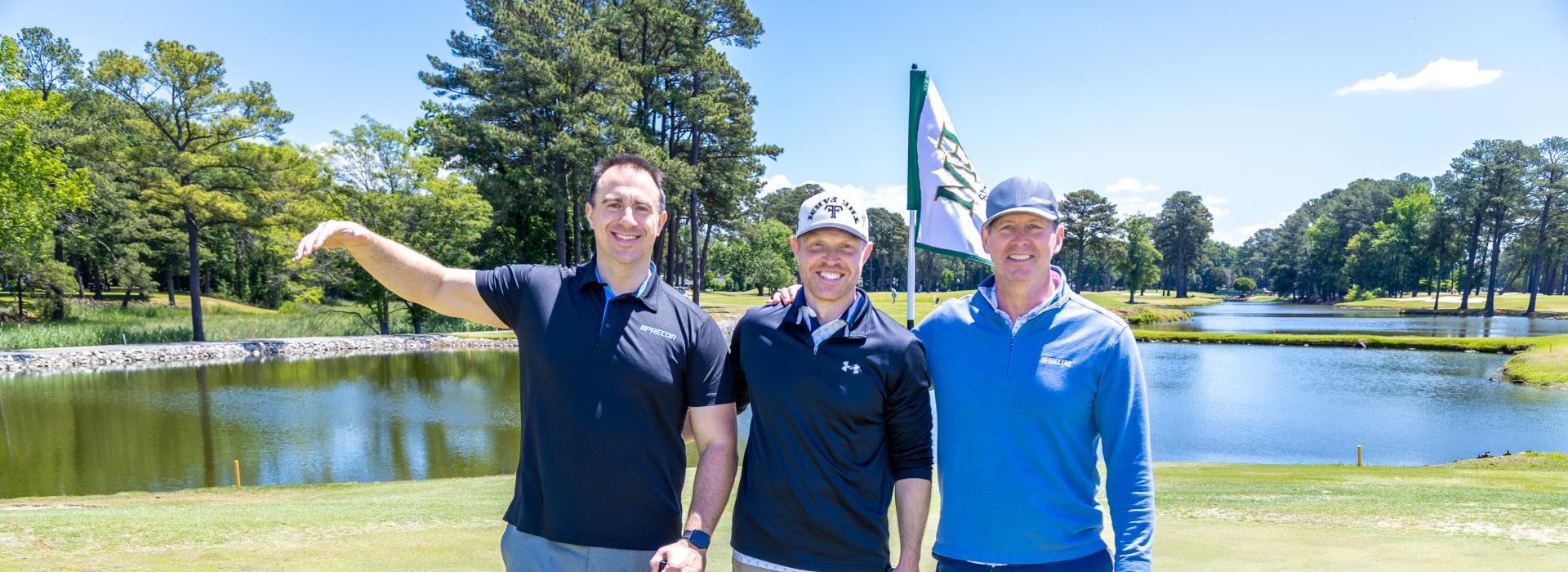 3 men on the golf green