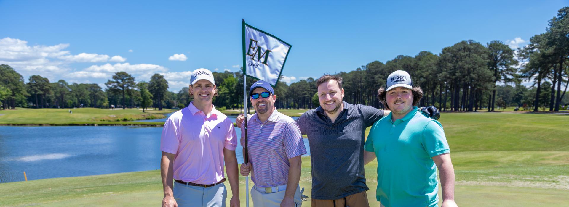 4 guys on a golf course