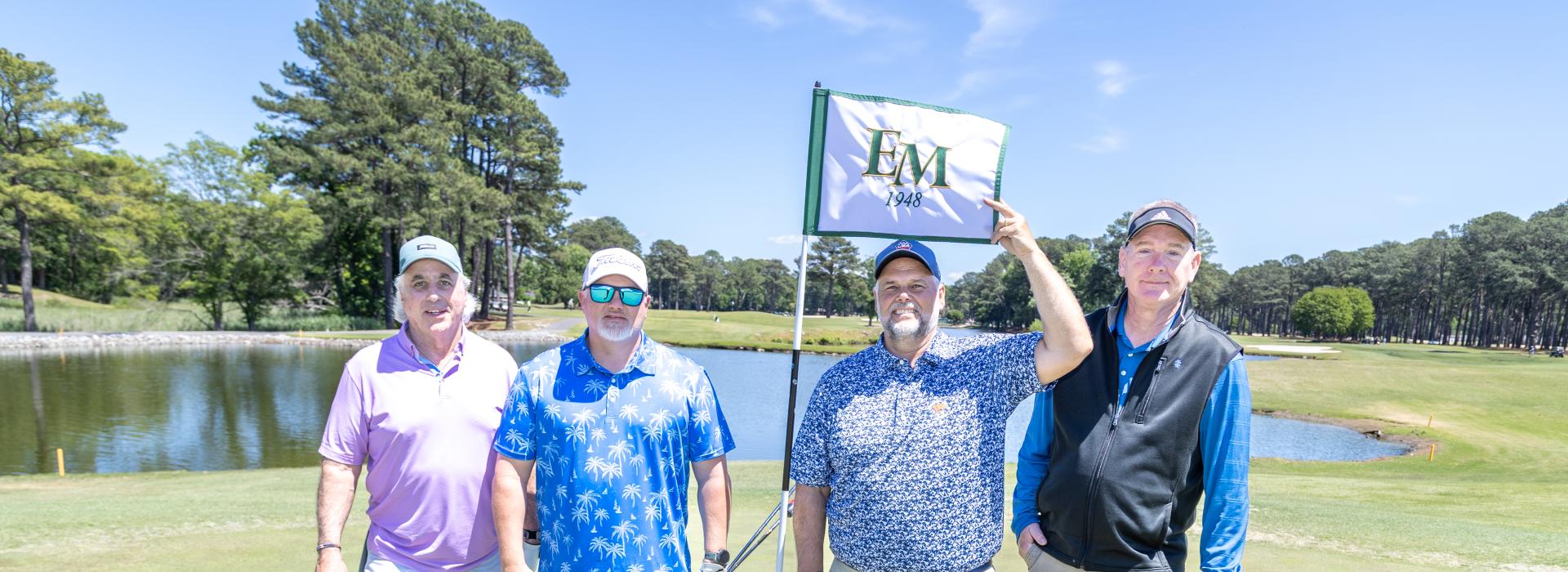 4 men on the golf course