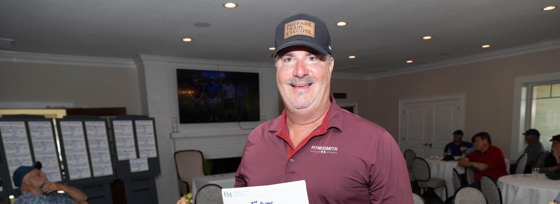 Man holding an envelope