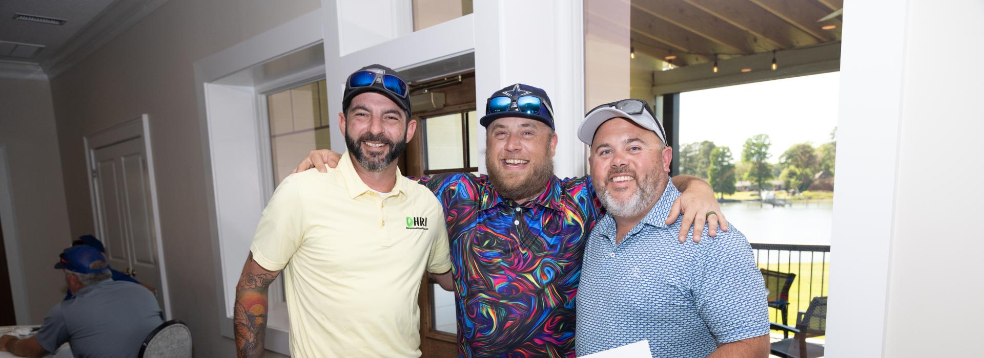 3 men in a golf club