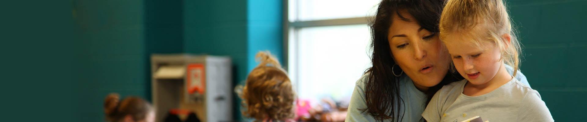 Y employee teaching child