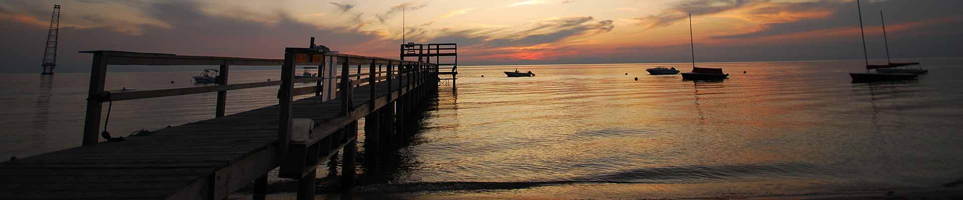 Sunset over the bay at YMCA Camp Silver Beach