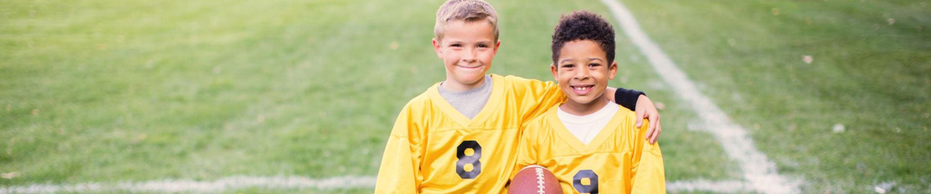 football kids smiling