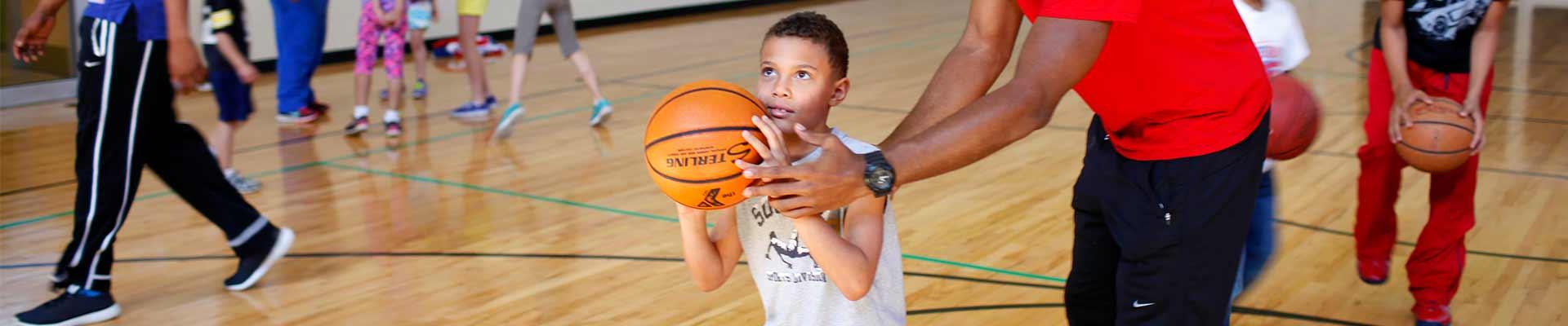 kid playing basketball