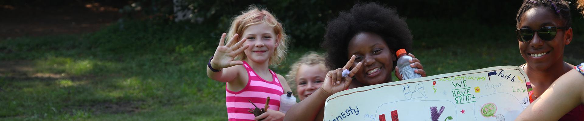 A group of girls with a camp counselor