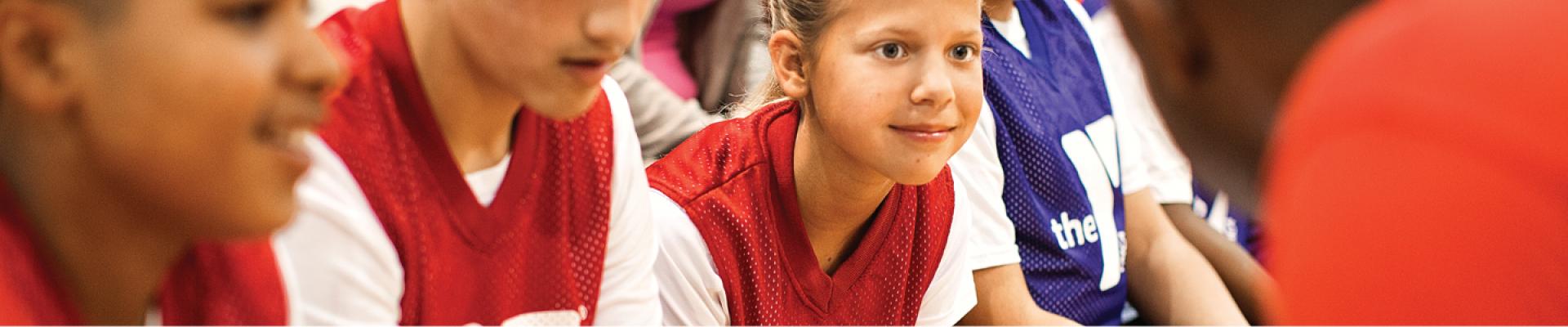 A group of YMCA youth sports players