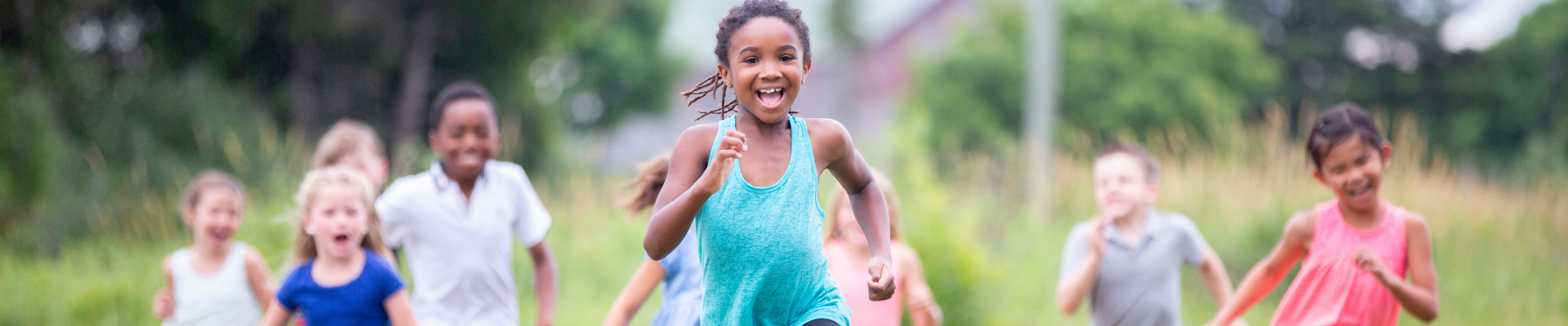 children running in a field