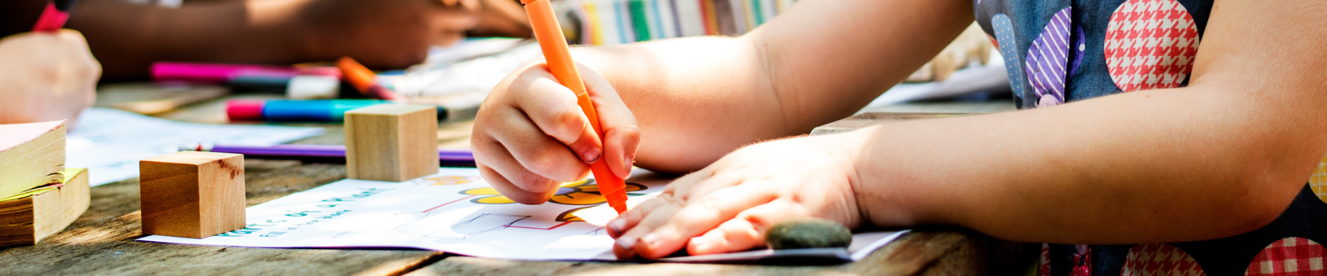 Group of kindergarten kids friends drawing art class outdoors