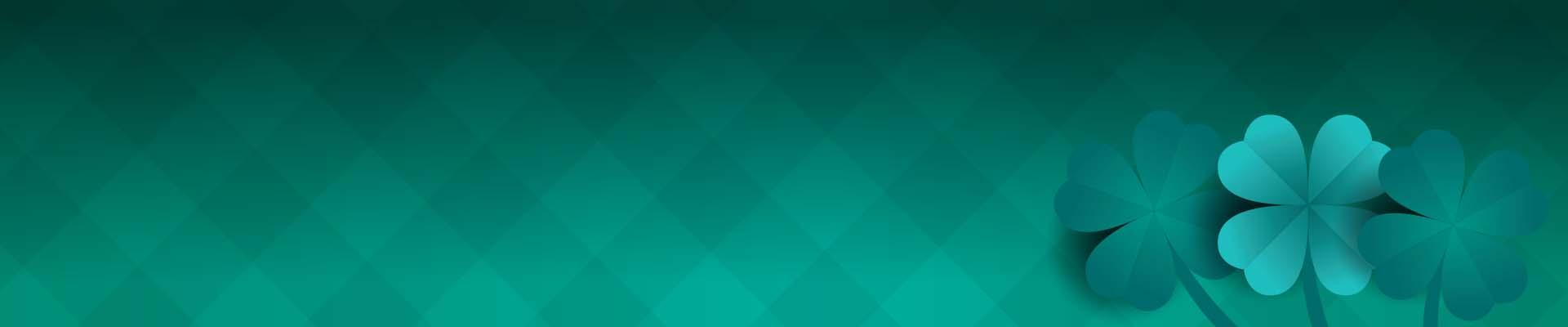 Green checkerd background with three four leaf clovers